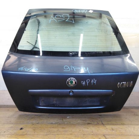 kryska-bagaznika-skoda-octavia-tour-nakladka-nad-nomerom-sniata-art-34500-big-0