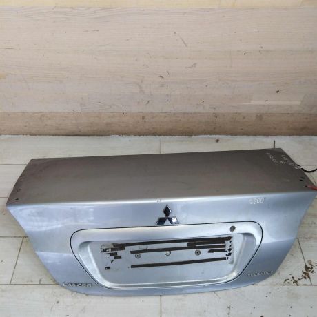 kryska-bagaznika-mitsubishi-lancer-9-sedan-defekt-vmiatina-art-95775-big-0
