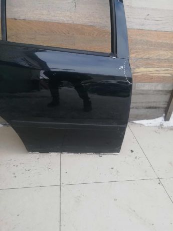 dver-zadniaia-pravaia-defekt-skoda-octavia-tour-sniat-molding-art-62045-big-3