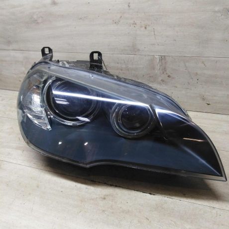 fara-pravaia-ksenon-bmw-x5-ii-e70-do-rest-defekt-v-niznei-casti-stekla-art-59651-big-0