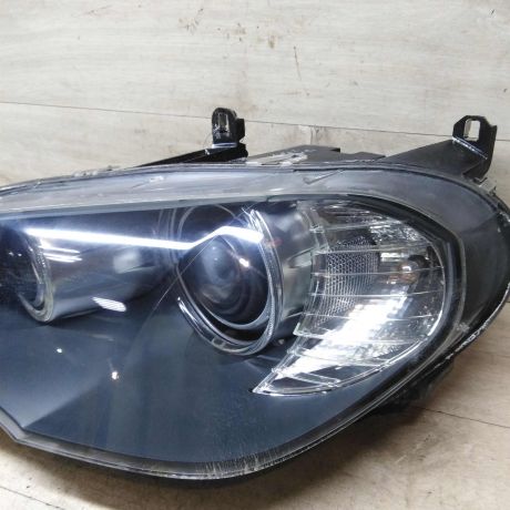 fara-levaia-ksenon-bmw-x5-ii-e70-do-rest-defekt-v-niznei-casti-stekla-art-59956-big-1
