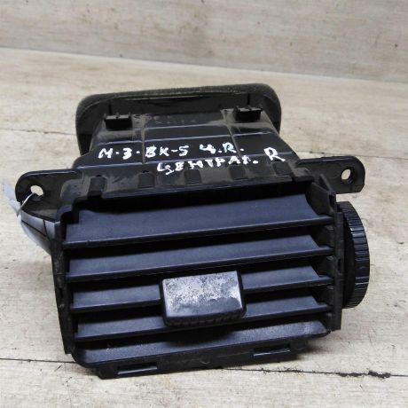 deflektor-obduva-salona-centralnyi-pravyi-mazda-3-bk-art-85251-big-0